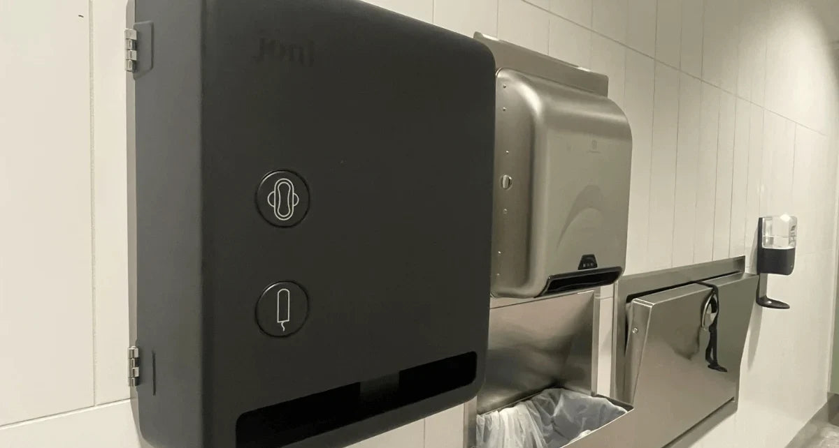 joni Model V period care dispenser in a bathroom at YYJ 