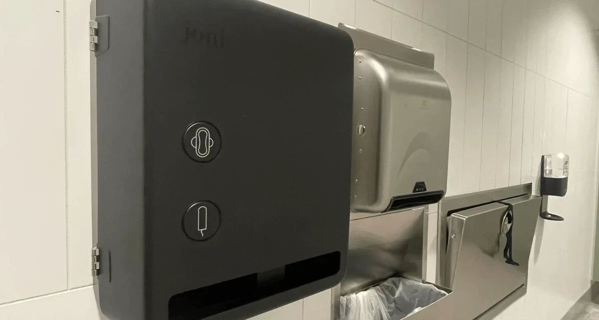 joni Model V period care dispenser in a bathroom at YYJ 