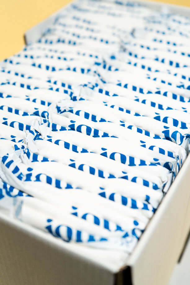 open bulk box of joni super pads