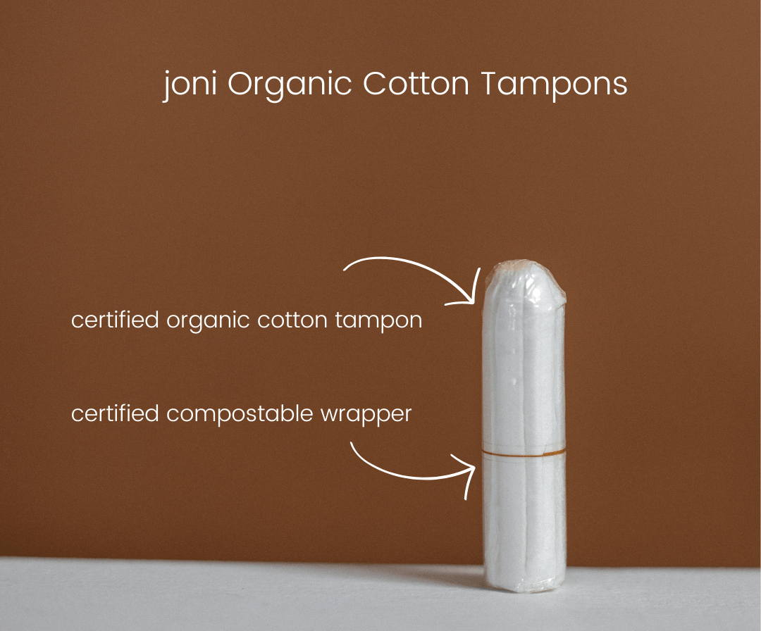 joni organic cotton tampon with certified compostable wrapper on a neutral background.